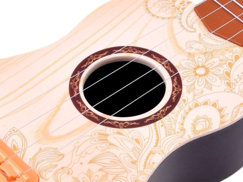 JOKOMISIADA Zabawka Gitara metalowe struny + piórko IN0095