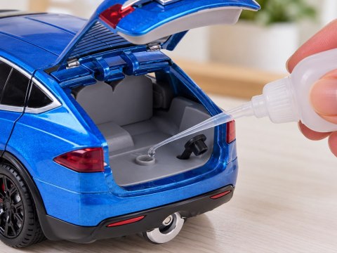 JOKOMISIADA Autko Tesla Model X RC 1:22 metalowy samochód na pilota LED dym RC0772